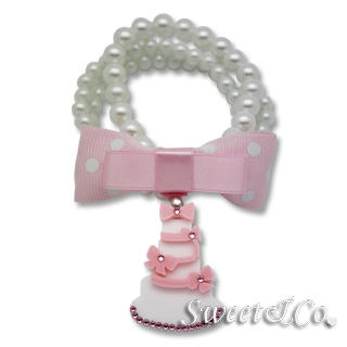 Sweet & Co. Sweet Pink polka dots bow dolly cake charm pearly bracelet Pink - One Size