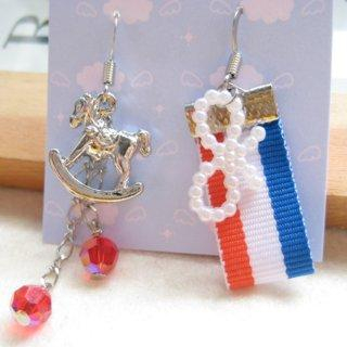 Fit-to-Kill Hand made Lovely merry-go-round with red Swarovski crystals earrings
