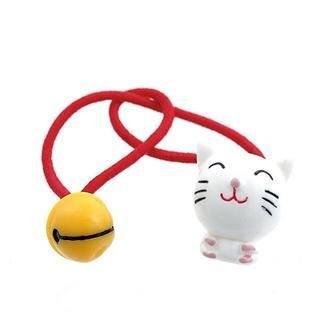 Pretty cat loves playing bell hair band