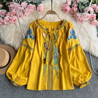 Long-Sleeve Crew Neck Floral Embroidered Tassel Tie Front Blouse