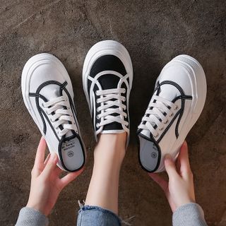 How to style sneakers with dresses according to Korean fashion?